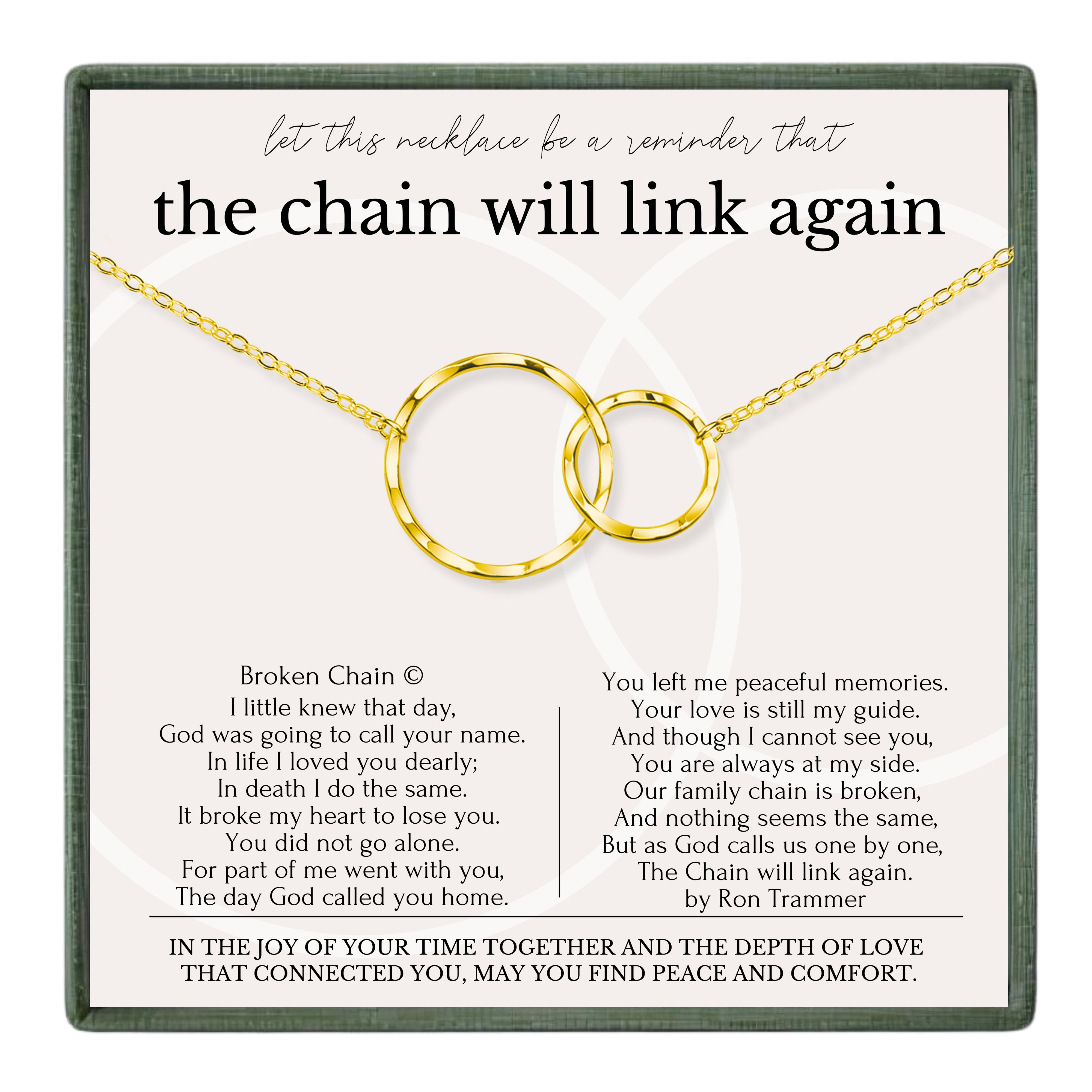 a necklace with a pendant that says "The chain will link again" and includes a poem about the chain symbolizing the connection between people.